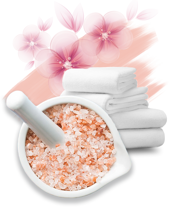 USH Spa beauty products — himalayan salt bowl, white towels and floral decor